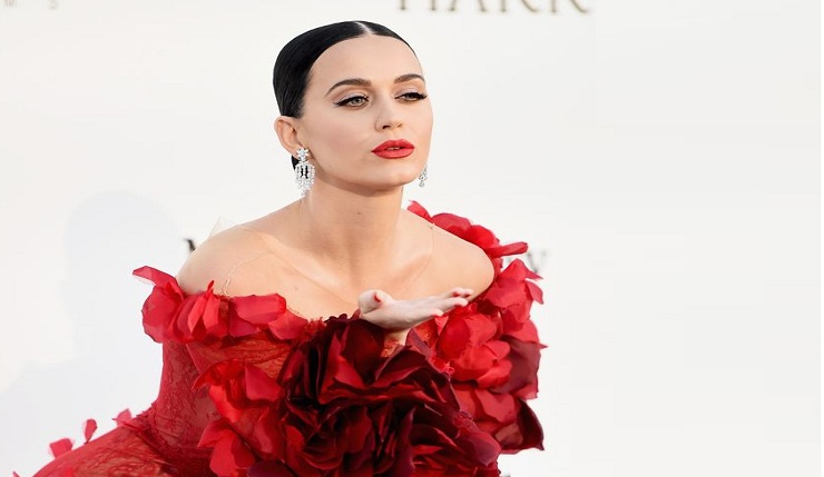 Katy Perry looks Red Hot in Flamenco-style Dress as she joins Orlando Bloom at amfAR Gala