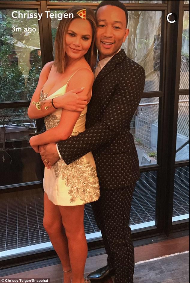 Chrissy Teigen & John get fancy to go out on date night in NYC