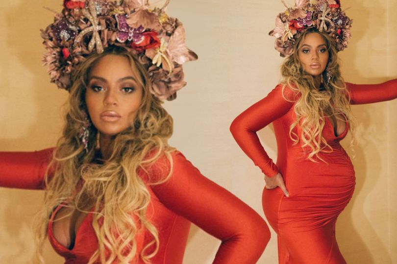 Beyonce shows off her growing baby bump in figure-hugging red dress and GIANT flower crown at the Wearable Art Gala