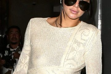 Kendall Jenner flashes nipple as she arrives at LAX Bra-less in Semi-sheer Top