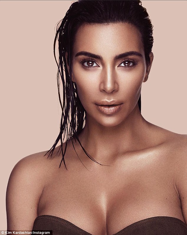 Kim Kardashian shows off her chest in new portraits for KKW makeup line that is expected to net  MILLION within MINUTES of going on sale