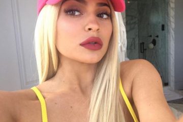 Kylie Jenner renews boob job rumours yet AGAIN while posing in a tiny yellow Bikini