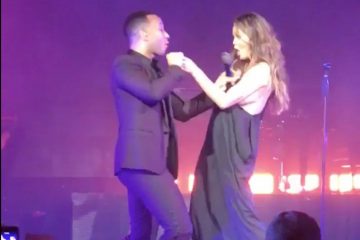 Watch in awe as Chrissy Teigen deals with her whole boob coming out on stage like a pro