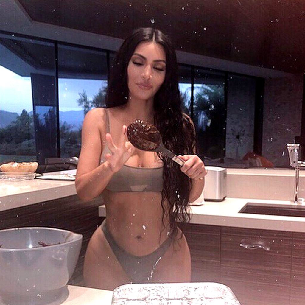 Kim Kardashian West has a “Bake Sesh” in her bra & thong