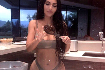Kim Kardashian West has a “Bake Sesh” in her bra & thong